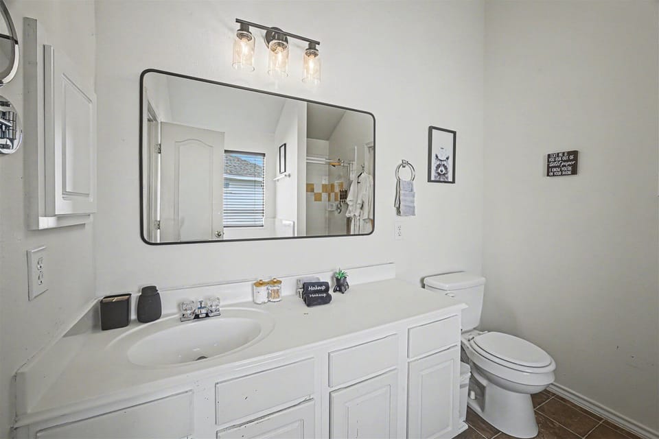 Primary bathroom is fully stocked with all you need. Makeup pads and q-tips included.
