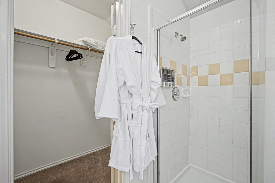 White robes and towels included.  Shampoo, conditioner, body wash, and body soap included for maximum comfort.