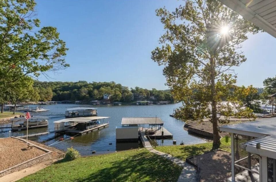 Experience the charm of Porter Mill Landing at the Lake of the Ozarks, featuring cozy interiors, inviting outdoor spaces, and scenic waterfront views.