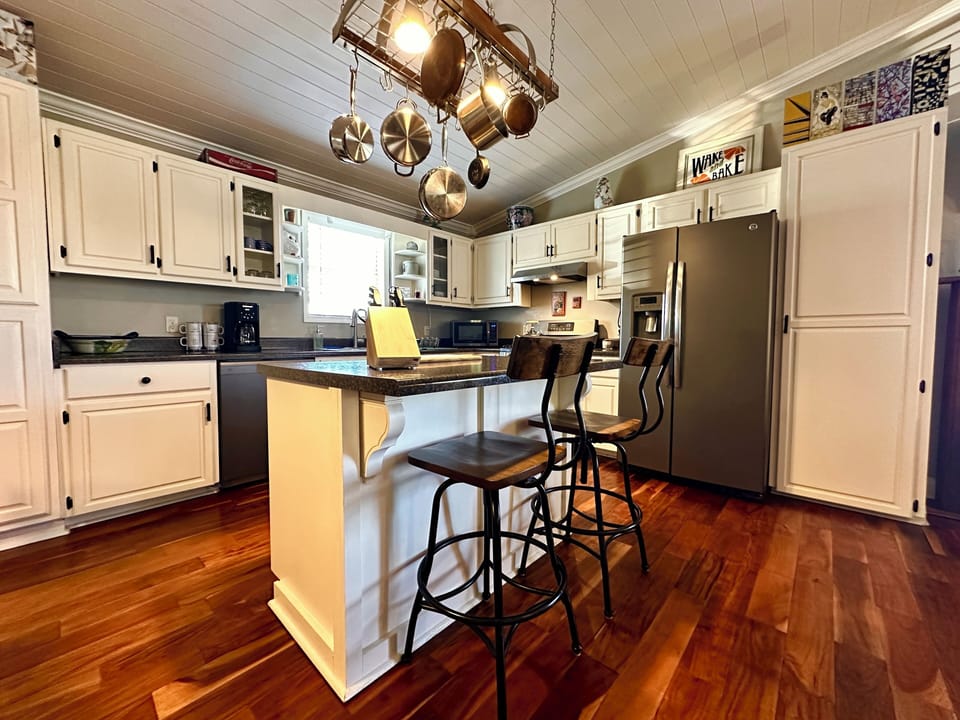Kitchen with bar top seating