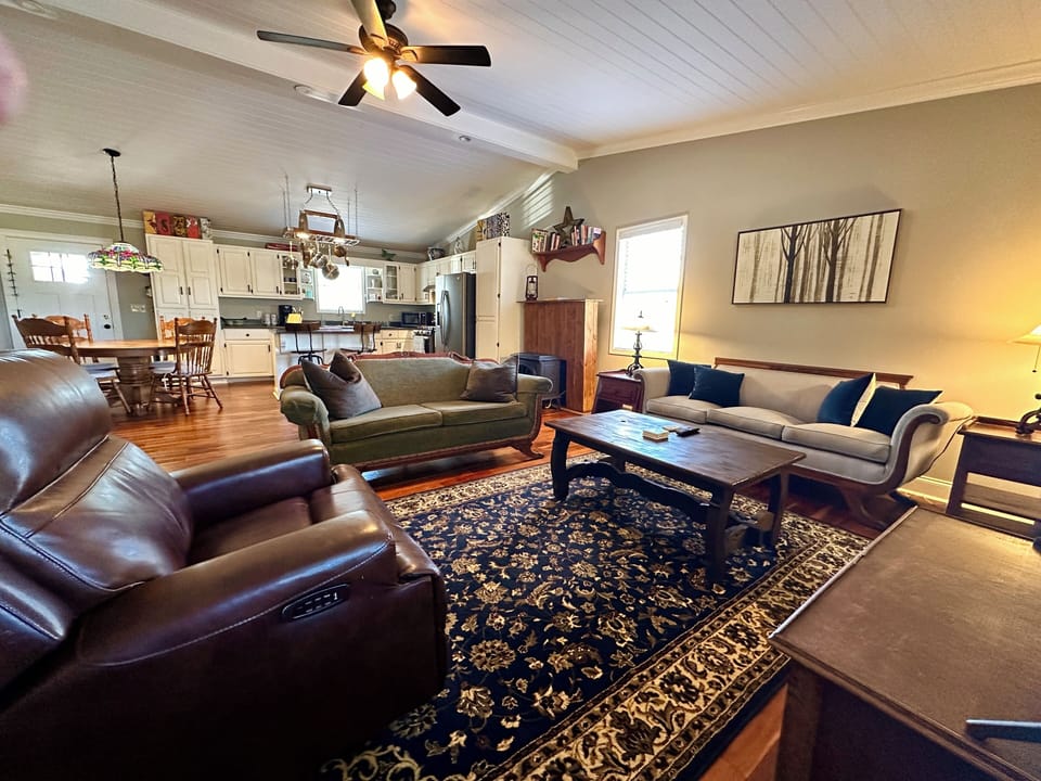 Living room with smart TV, books and games