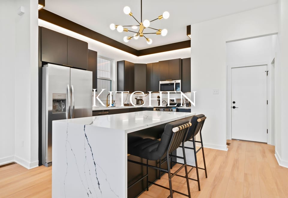The kitchen is thoughtfully arranged for casual meals, light cooking, and spending time together.