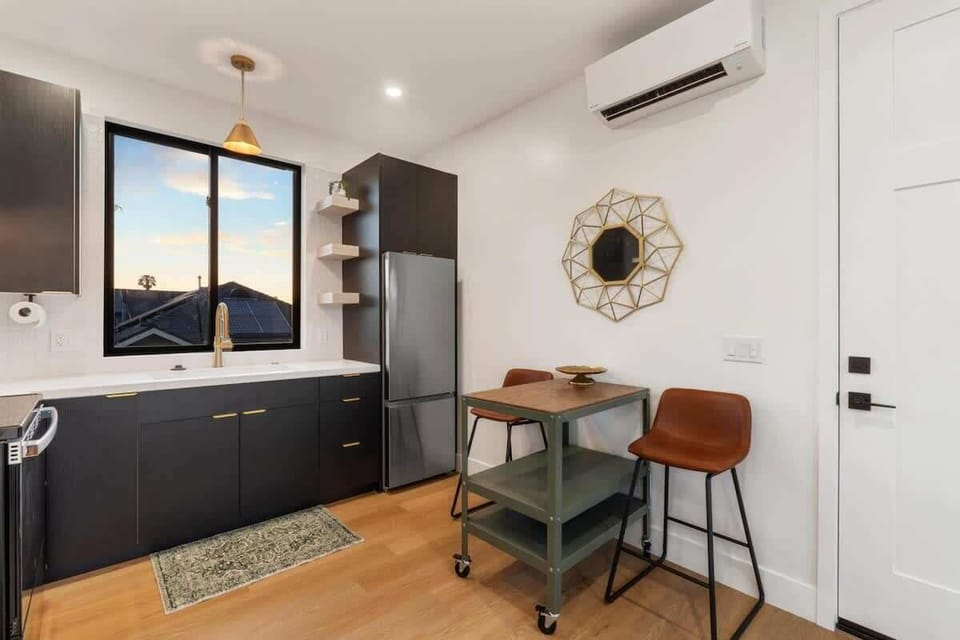 Modern kitchen with desk — ideal for remote work