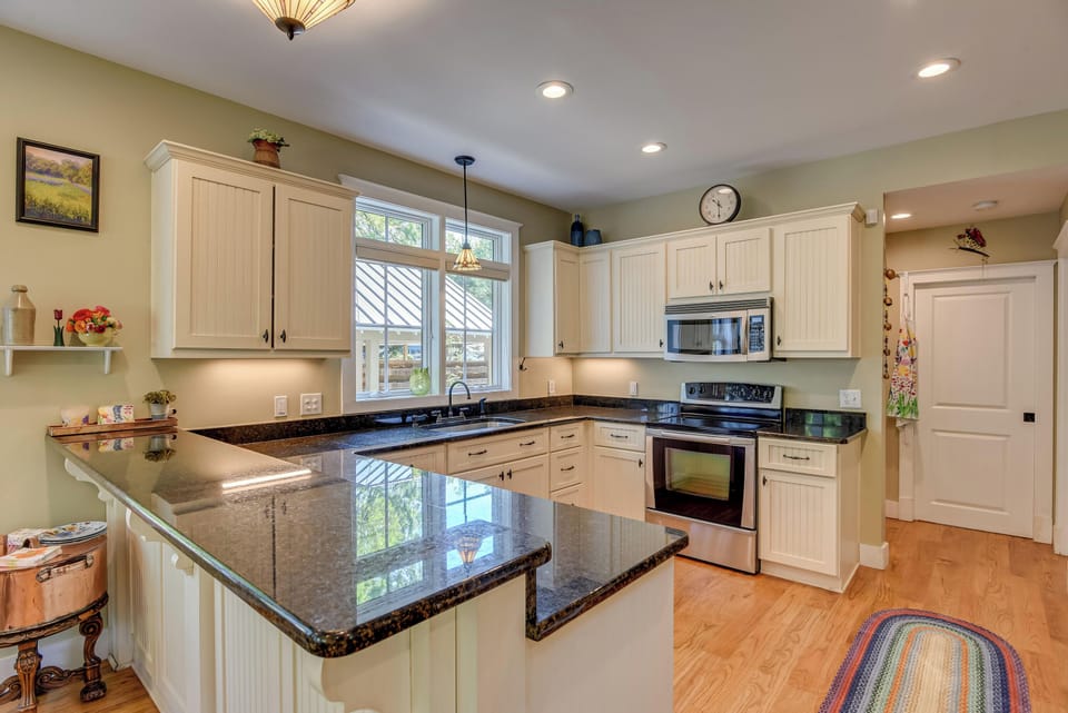 Lovely Kitchen . Charging stations on counter.