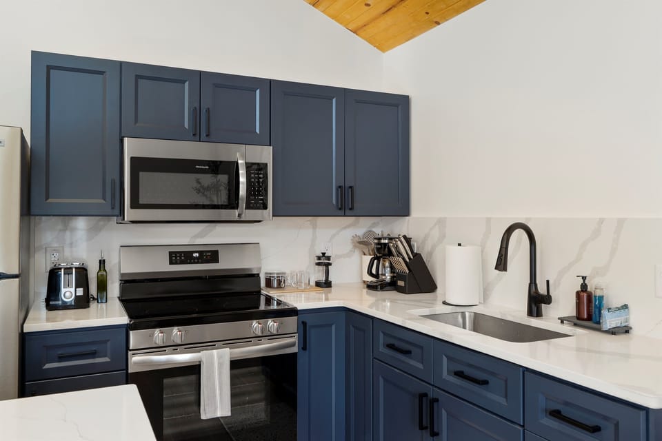 Cook up your favorites with modern appliances and all the essentials at your fingertips.