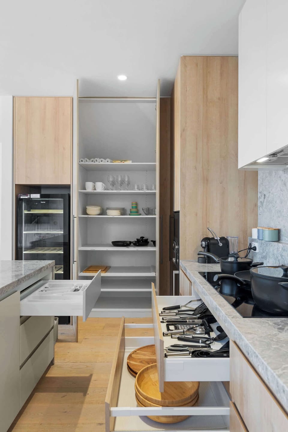 Kitchen includes an Italian-made Lavazza coffee machine, plus a starter cooking essentials pack with oil, salt, and pepper.