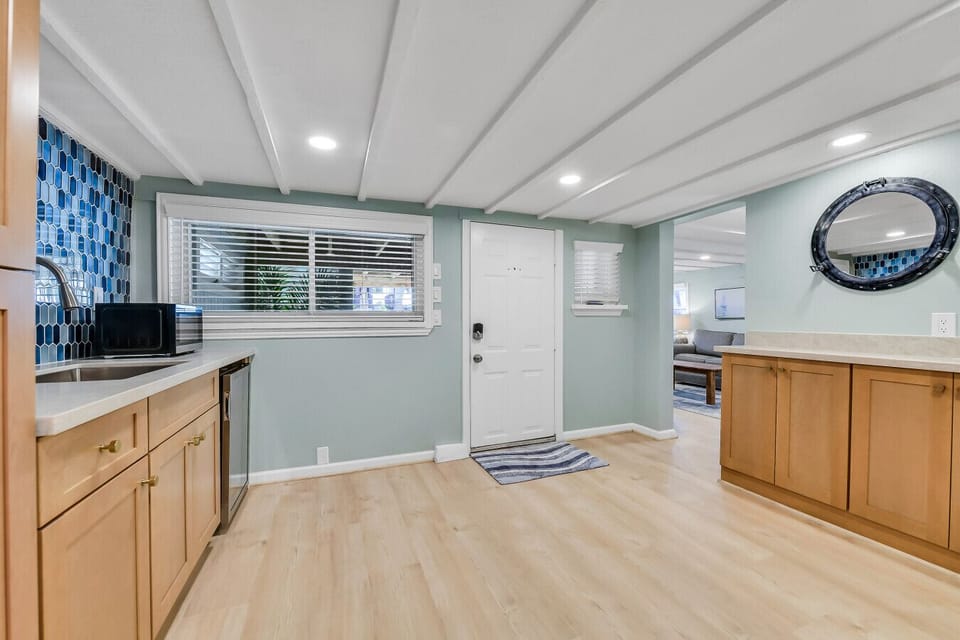 Direct access from the lower-level to the hot tub and outdoor bar | Perfect for seamless indoor-outdoor living