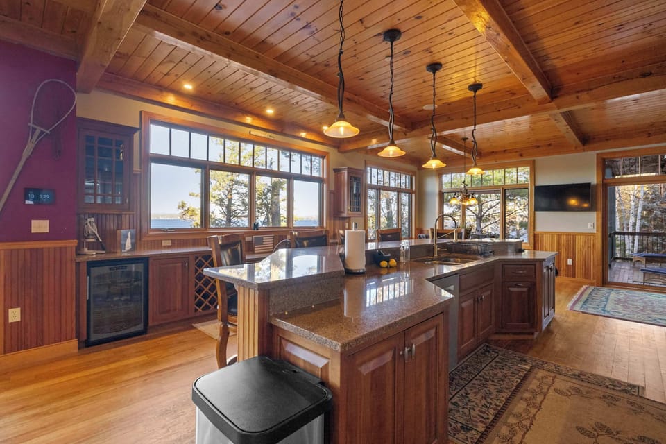 Spacious chef’s kitchen with premium appliances and seating