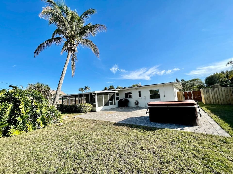 Fenced in Backyard with Hot Tub and Screened in Porch!