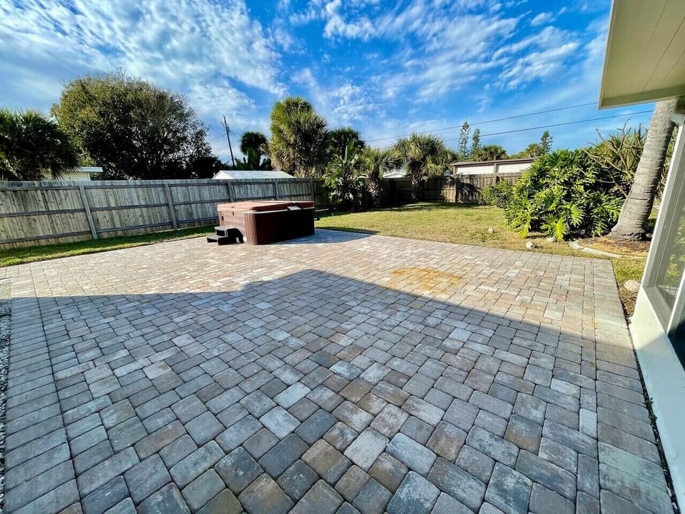 Fenced in Backyard with Hot Tub and Screened in Porch!