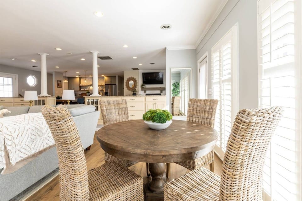 Another view of the Four-top table looking into the rest of the main floor living space.