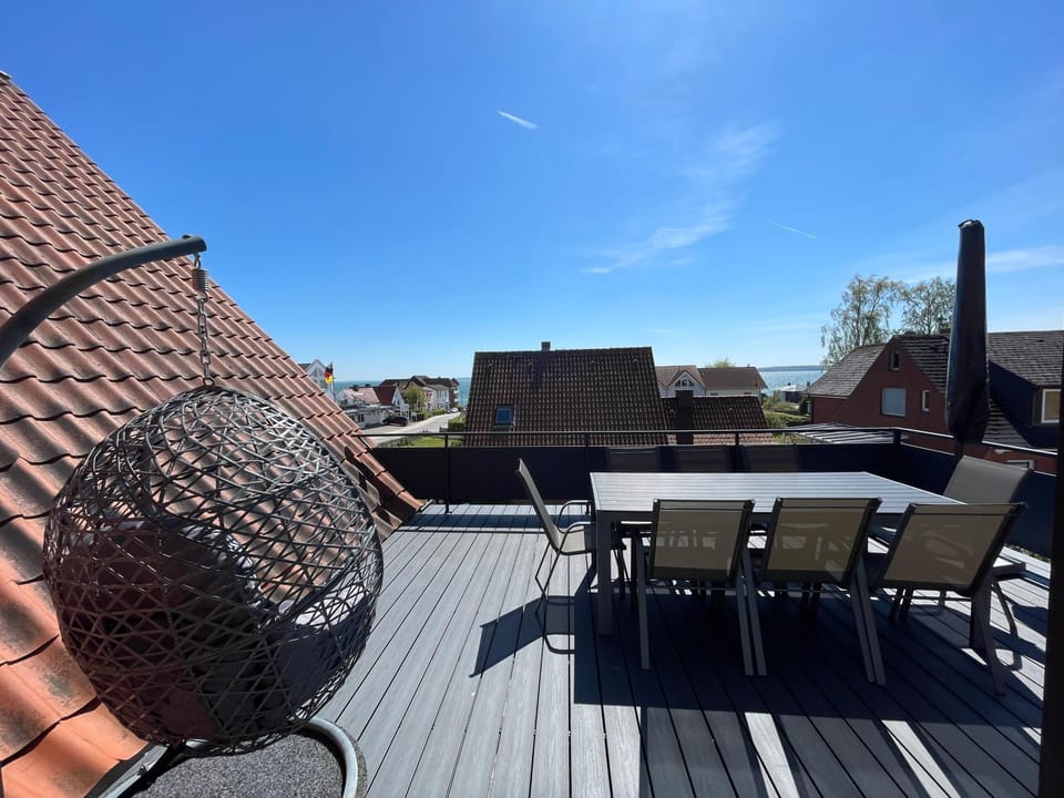 Enjoy relaxing hours on the spacious terrace with stunning views.