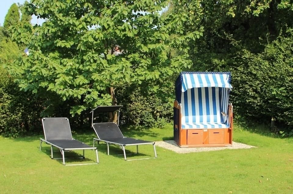 Enjoy relaxing hours on this spacious terrace with loungers and a beach chair.