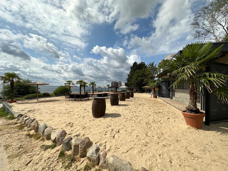 Relax at the dreamy sandy beach under palm trees!