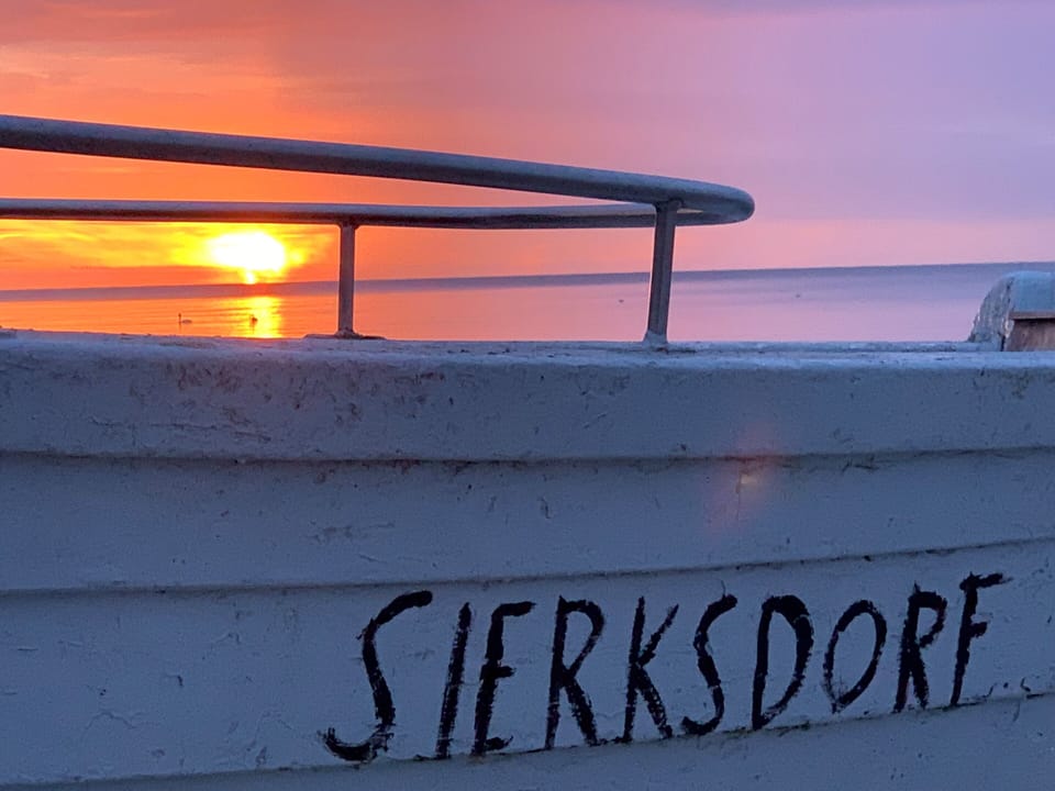 Enjoy breathtaking sunrises at Sierksdorf beach.