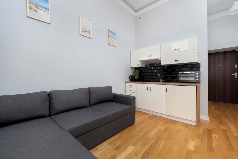 The seamless connection between the living area and kitchenette creates a comfortable, cohesive space where it’s easy to feel at home and make the most of your stay.


