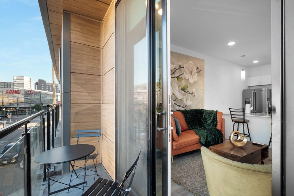 Private balcony with seating where you can enjoy fresh air and city views.