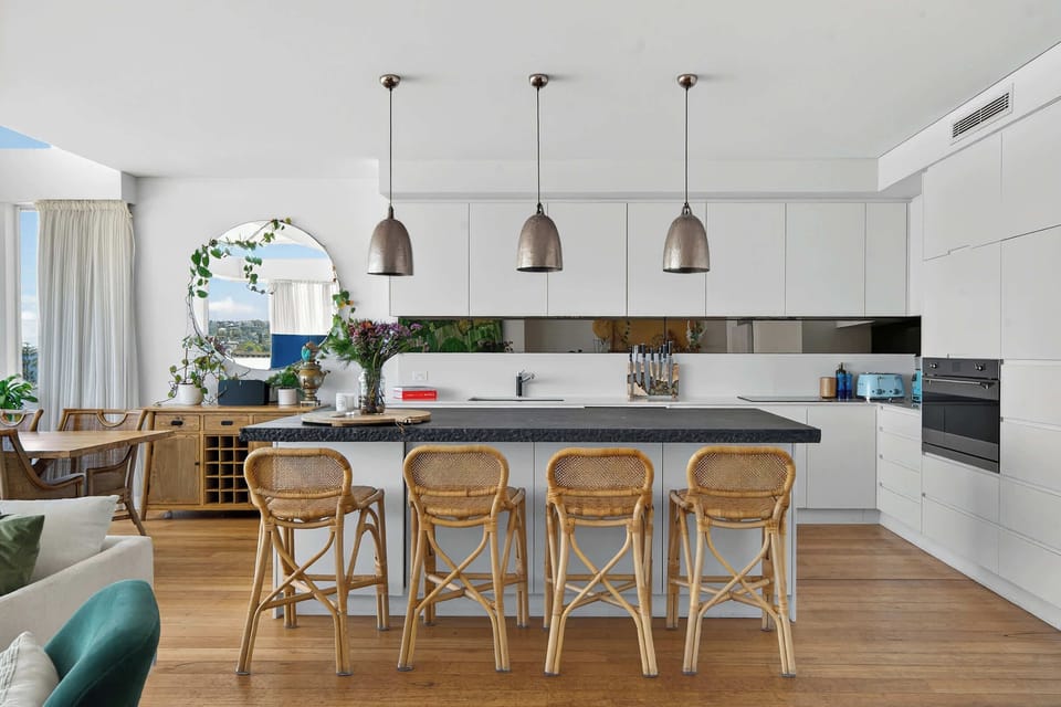 Open plan chefs kitchen with large island bench perfect for gatherings
