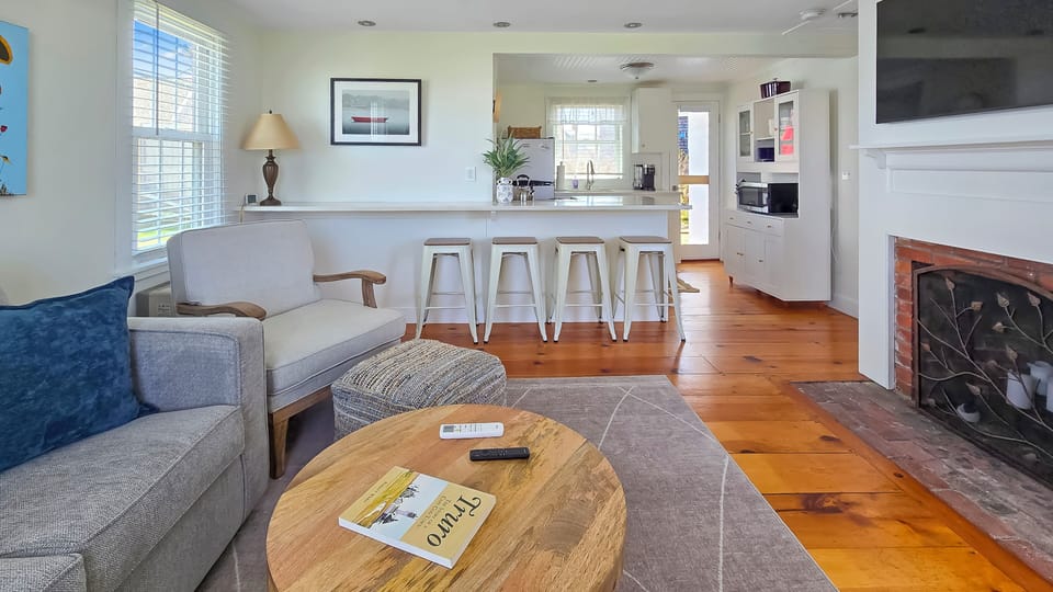Living room opens to kitchen