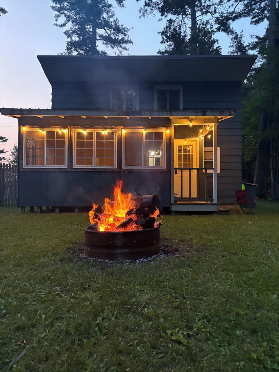 Back of the property includes a nice fire pit to sit around in the evening.