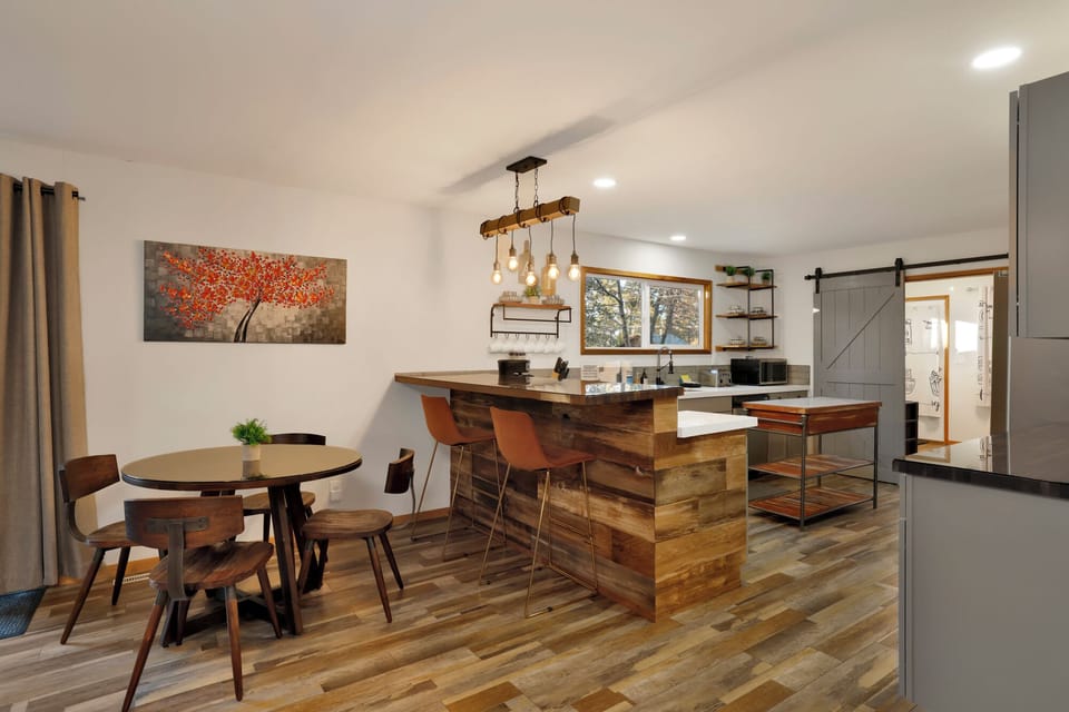 Inviting dining area designed for comfort and connection. The space feels open and airy, with a warm atmosphere that makes everyday meals and special gatherings equally enjoyable.