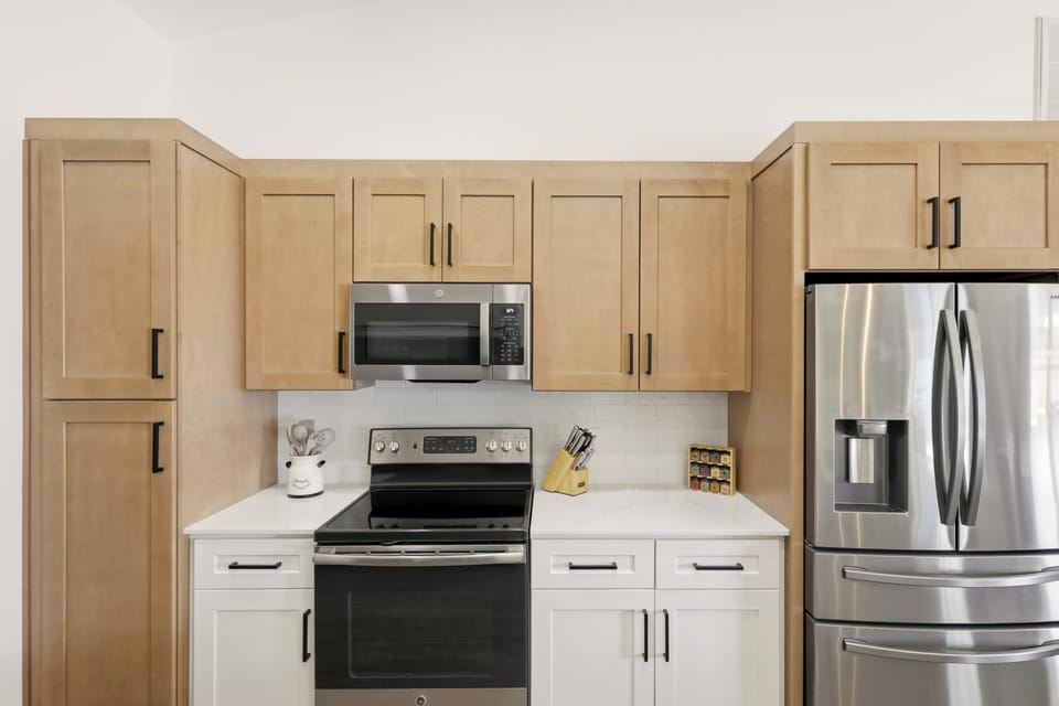 Modern kitchen with stainless appliances and clean finishes