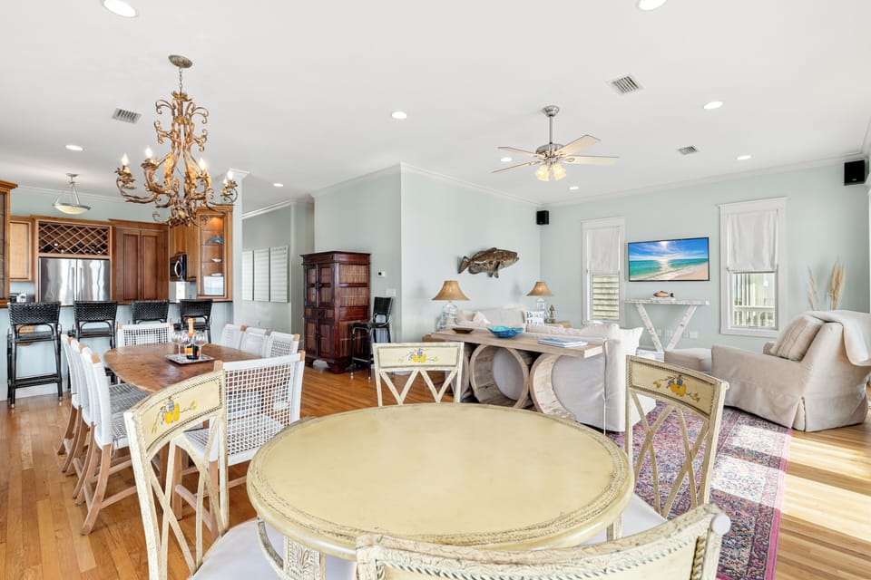 Gather around this stunning open-concept space where your group can cook, dine, and relax together in coastal elegance.
