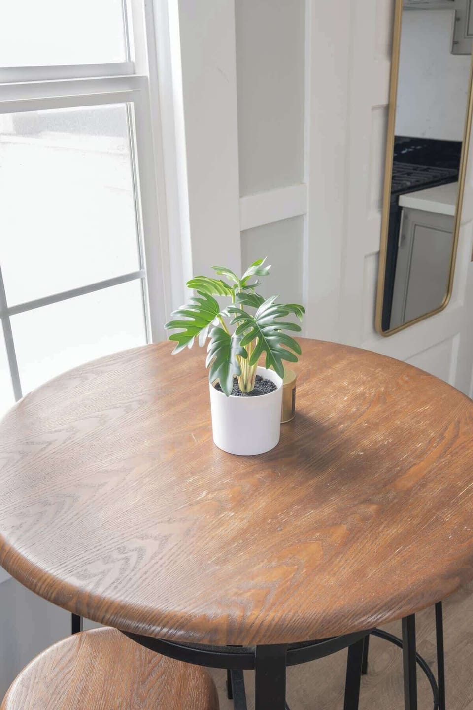 Eat together by the window at the café style dining table for two
