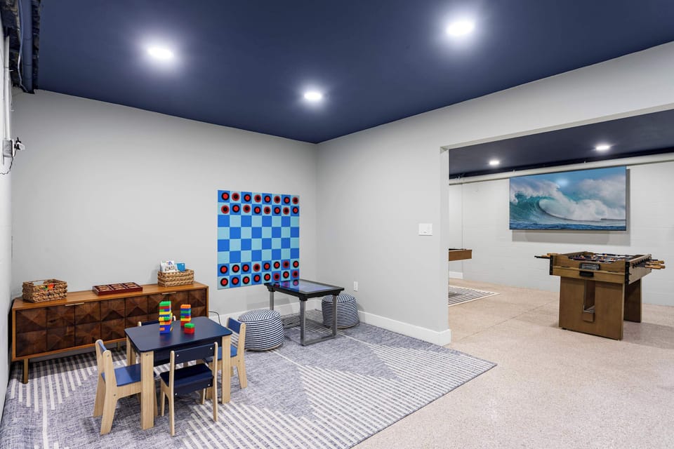 Game Room: Unleash fun with foosball, checkers, and colorful decor for endless family enjoyment!