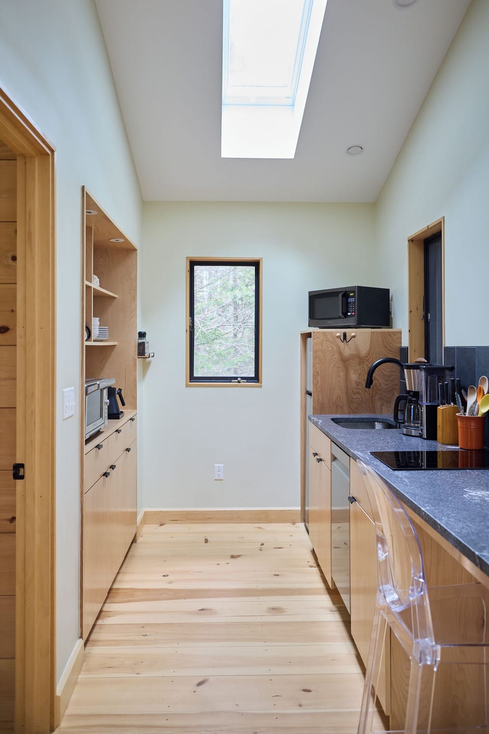 Custom cabinets and textured granite countertops are a standout in the kitchen.