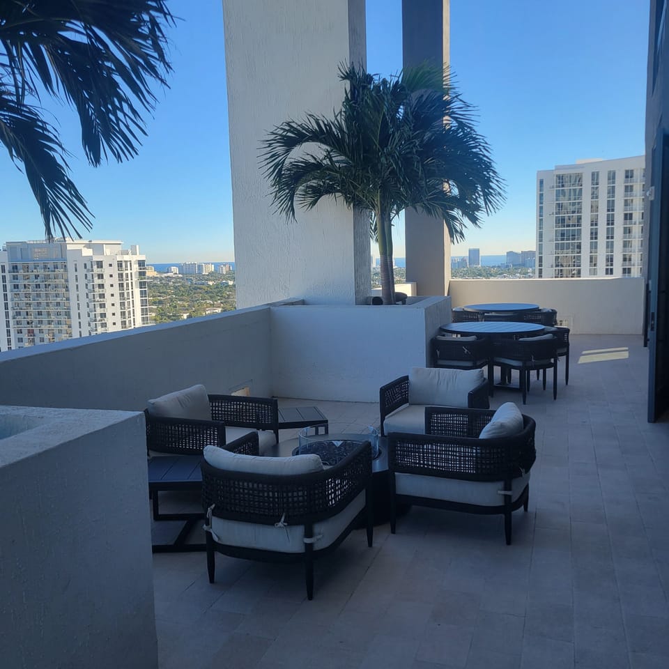 Outdoor area with fireplace.