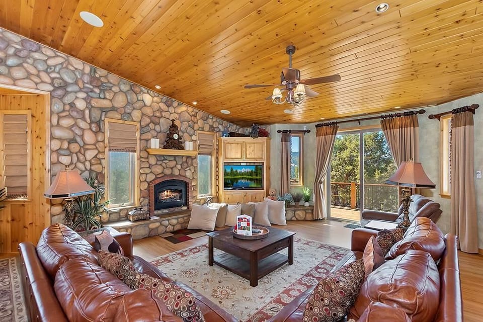 Great Living Room Area with Fireplace and TV