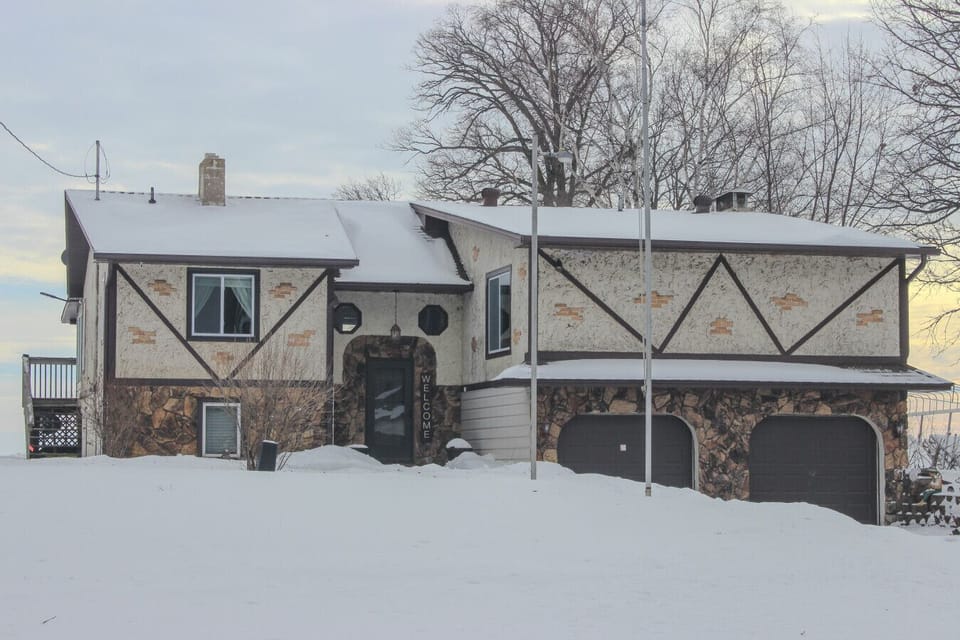 Welcoming winter arrival—plenty of parking and a cozy retreat waiting inside