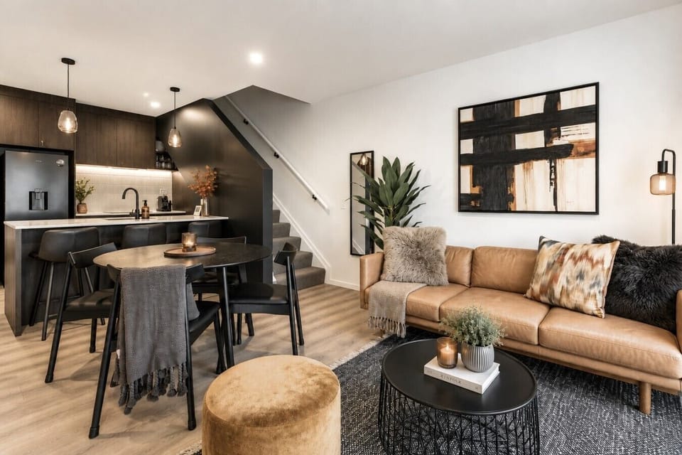 evara queenstown sofa and dining area