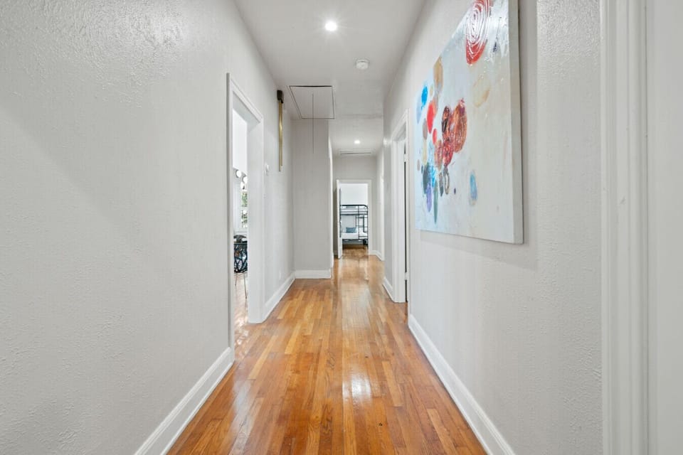Hallway to bedrooms and hall bathroom 1.
