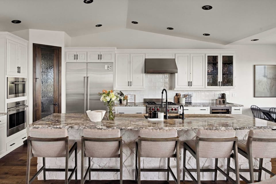 Cook with ease in the spacious kitchen featuring generous seating and premium appliances.