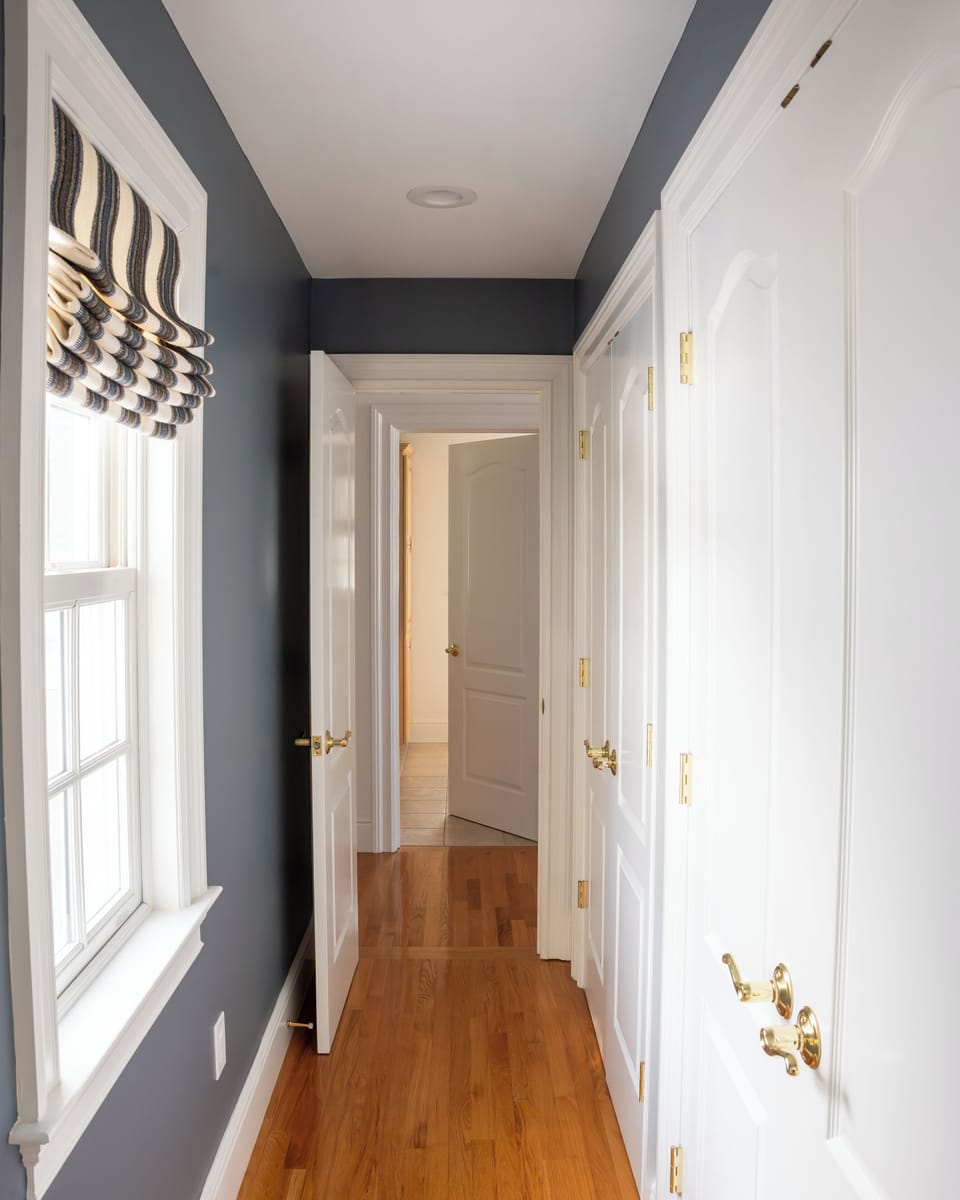 Hallway from front view bedroom leading to bathroom