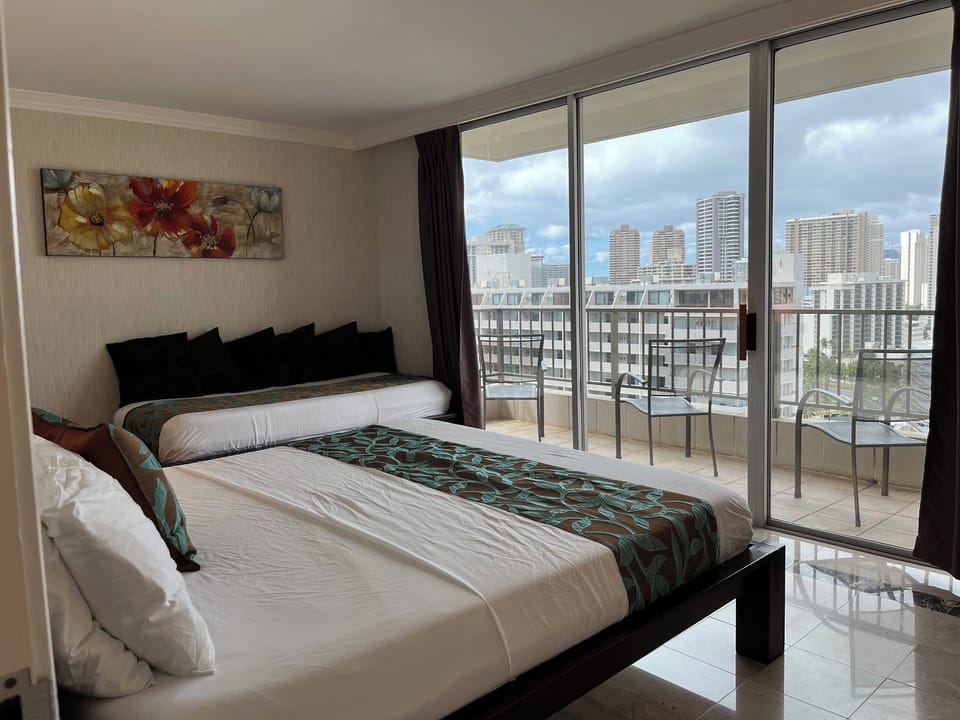 Bedroom 3 ( King plus Twin beds ),  Ocean and Mountain Views.