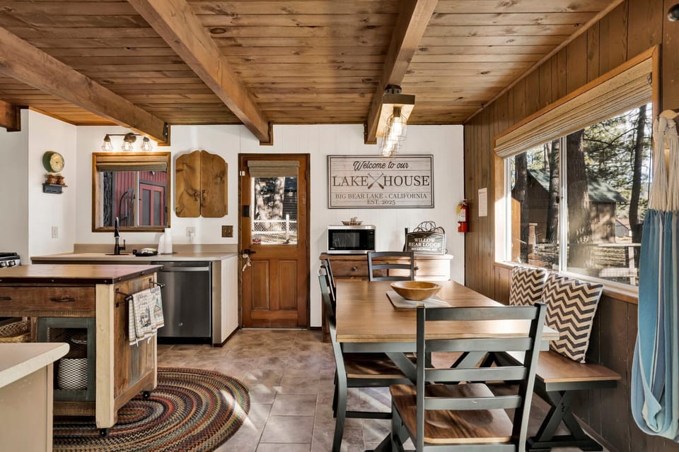 Spacious full kitchen stocked with basic cookware, dishware, and appliances for everyday use.