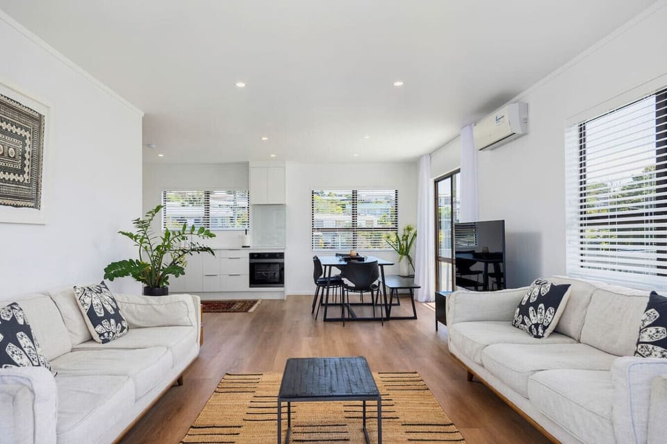 Upstairs living area with sweeping views, dining, main kitchen, complete with air conditioning and Smart TV