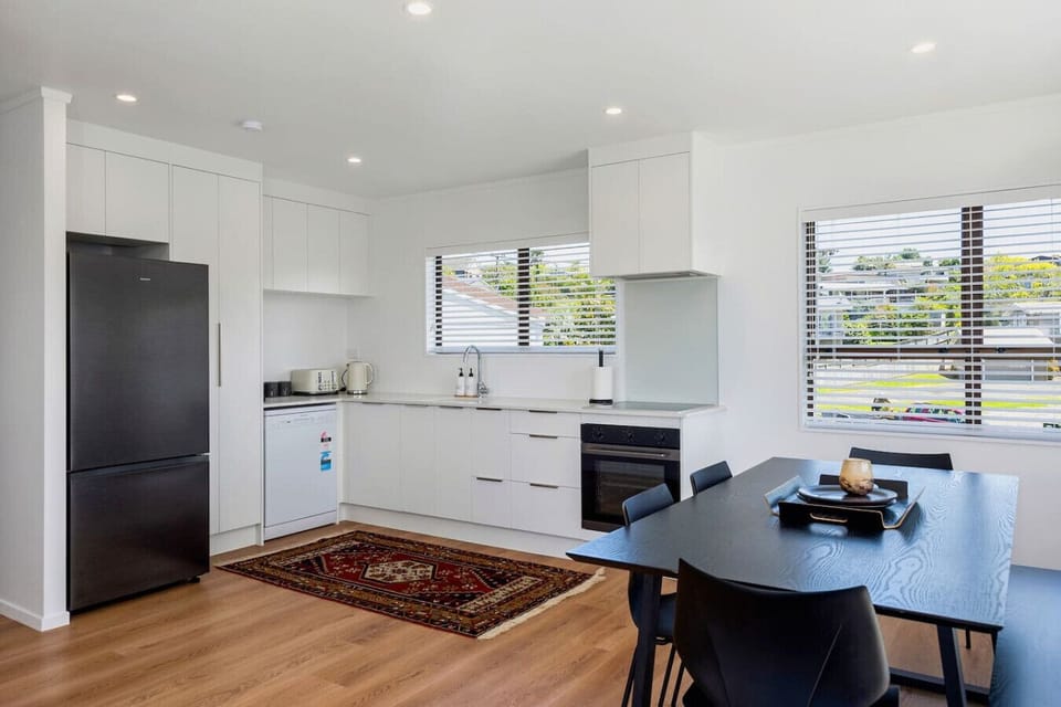 Main kitchen upstairs - fully equipped for 8 guests with oven, hobb, fridge freezer, dishwasher, microwave, kettle and toaster, Nespresso machine, and large pantry