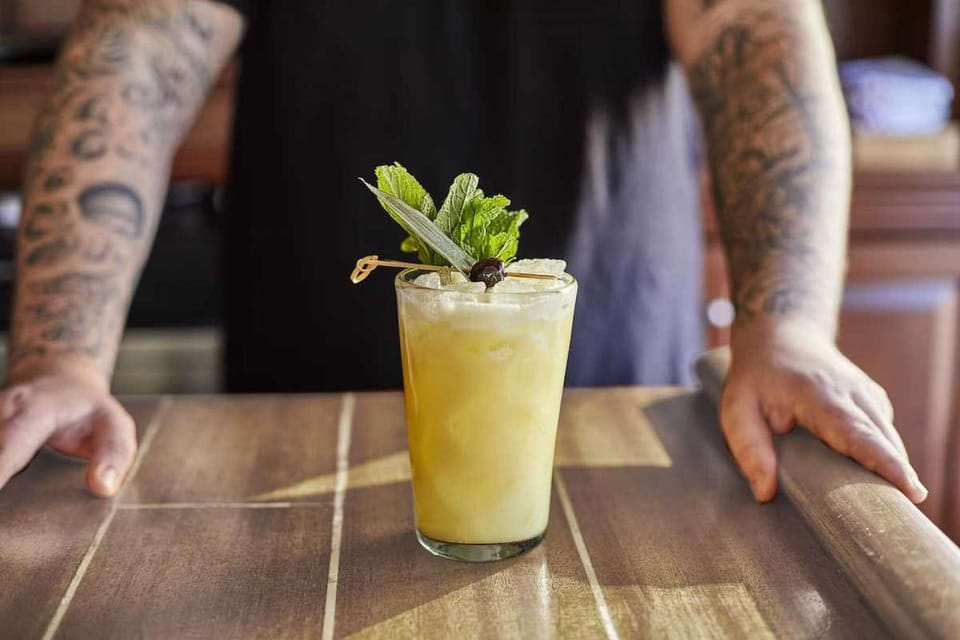 Fresh citrus drink served at the bar with mint garnish