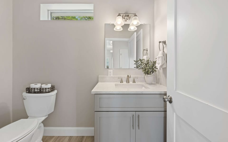 Main Level half bath, right off the entrance
