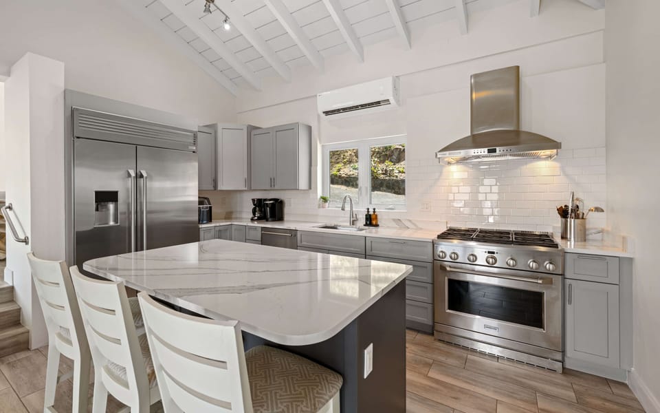 Bright, open kitchen with island seating