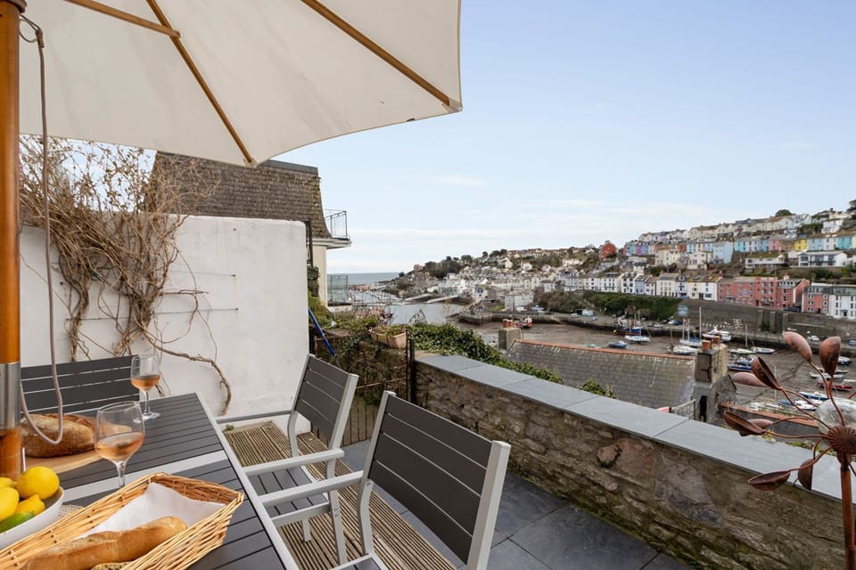 Sun terrace with dining table for 6 and stunning views over Brixham Harbour and out to sea