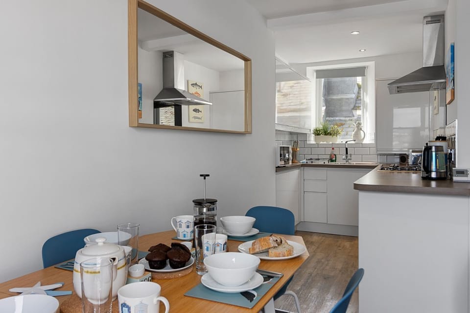 Cook up a storm in the well equipped kitchen and enjoy meals together at the dining table