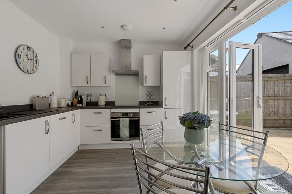 Open-plan kitchen with seamless flow to the private garden terrace ÃƒÂ¢Ã¢â€šÂ¬Ã¢â‚¬Å“ ideal for entertaining