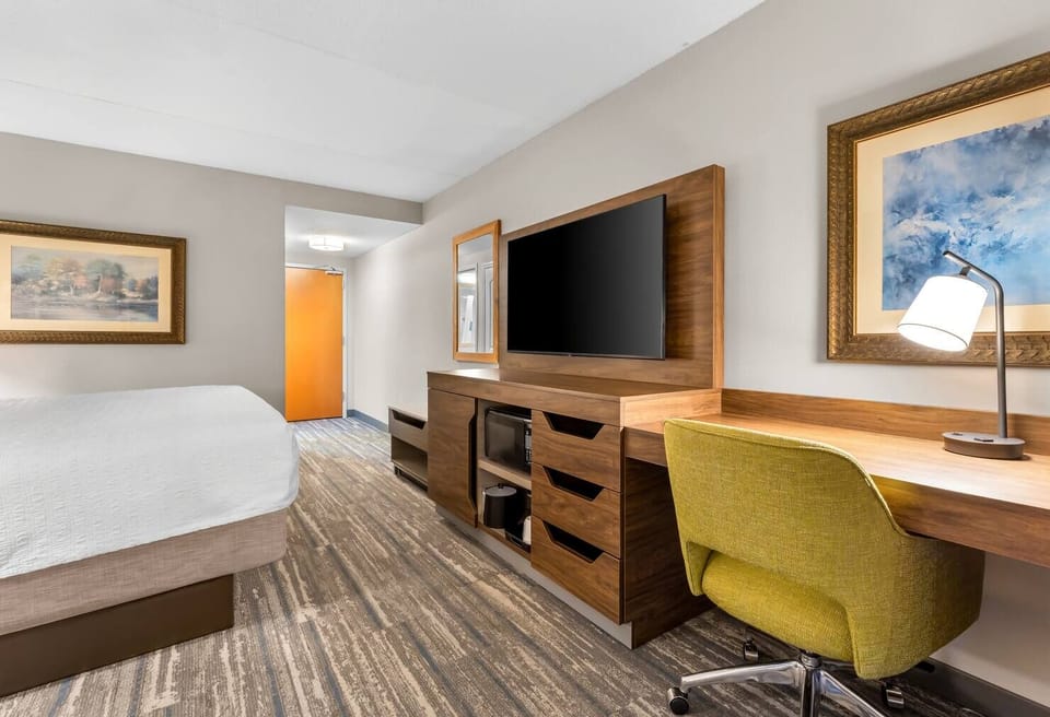 Settle in at the roomy desk for focused, comfortable work.