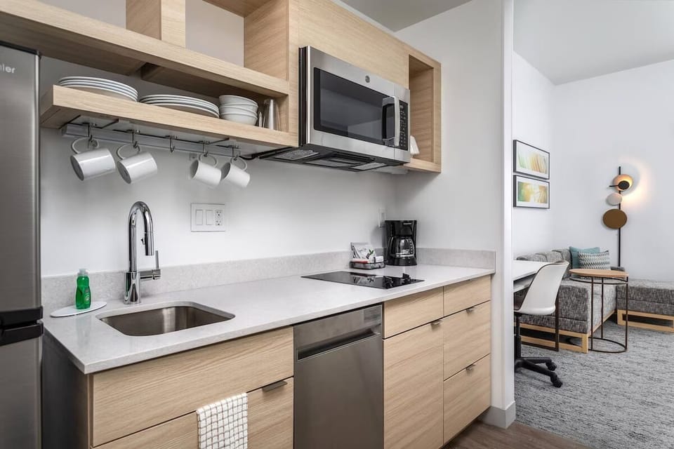 Whip up simple meals in the sleek, well-stocked kitchenette.