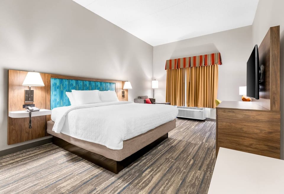 Enjoy a smooth stay with streamlined storage and entertainment.